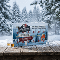 Ole Smoky 12 Days of Moonshine advent calendar in the snow with moonshine shot glasses